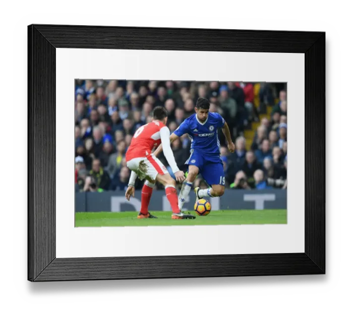 Framed Print : Battle at Stamford Bridge: Diego Costa vs. Laurent Koscielny - Intense Rivalry between Chelsea and Arsenal Players Framed Print : Battle at Stamford Bridge: Diego Costa vs. Laurent Koscielny - Intense Rivalry between Chelsea and Arsenal Players