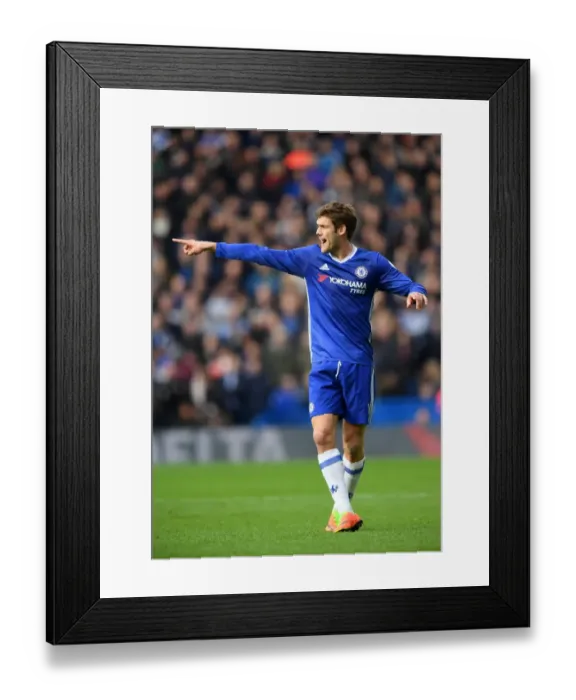 Framed Print : Marcos Alonso Signaling: Chelsea vs. Arsenal, Premier League Showdown at Stamford Bridge Framed Print : Marcos Alonso Signaling: Chelsea vs. Arsenal, Premier League Showdown at Stamford Bridge