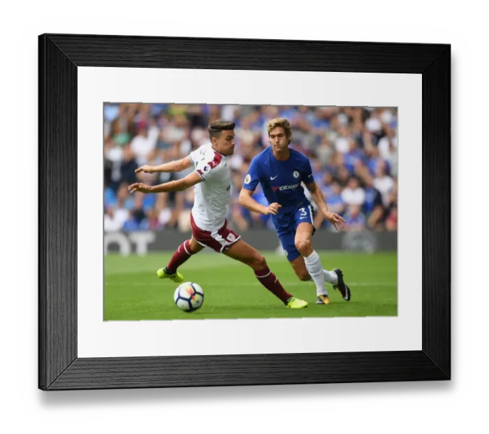 Framed Print : Marcos Alonso vs Robbie Brady: Intense Tackle in Chelsea vs Burnley Premier League Match Framed Print : Marcos Alonso vs Robbie Brady: Intense Tackle in Chelsea vs Burnley Premier League Match