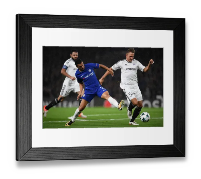 Framed Print : Pedro vs Rzezniczak: A Battle for Possession in the UEFA Champions League Framed Print : Pedro vs Rzezniczak: A Battle for Possession in the UEFA Champions League