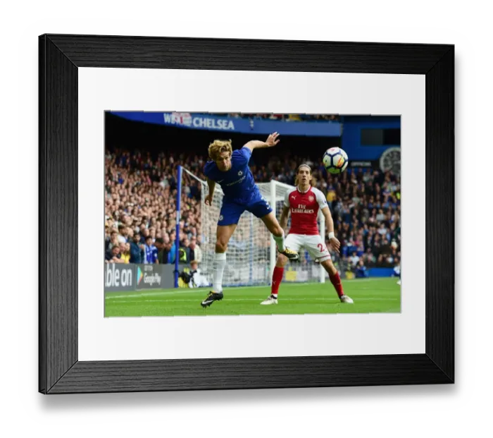 Framed Print : Marcos Alonso Heads the Ball: Chelsea vs Arsenal at Stamford Bridge