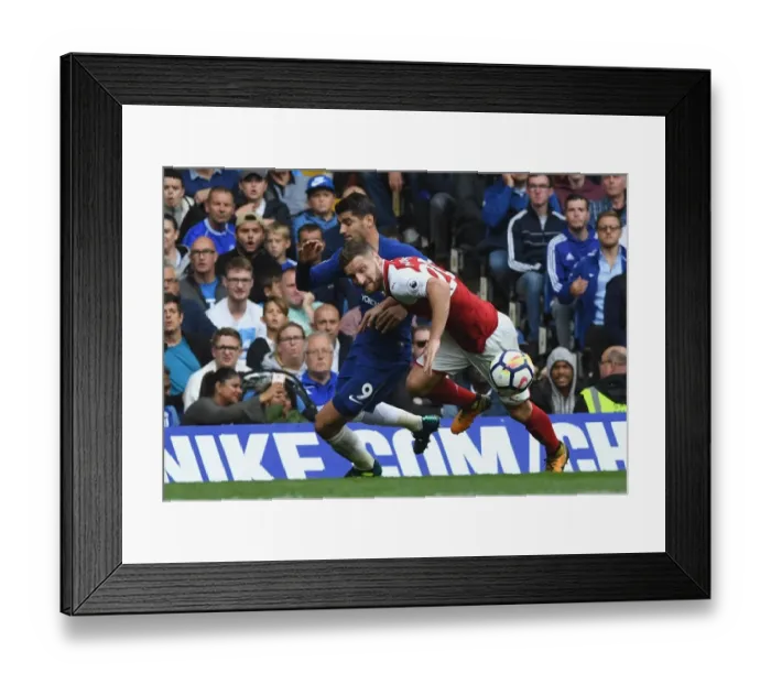 Framed Print : Clash at Stamford Bridge: Morata vs Mustafi - Premier League Showdown