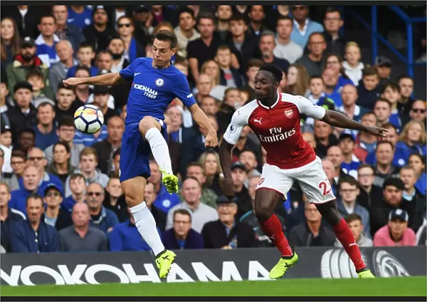Azpilicueta vs. Welbeck: Battle for Possession in Chelsea vs. Arsenal Premier League Clash