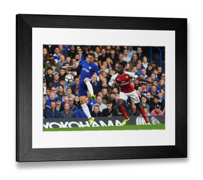 Framed Print : Azpilicueta vs. Welbeck: Battle for Possession in Chelsea vs. Arsenal Premier League Clash
