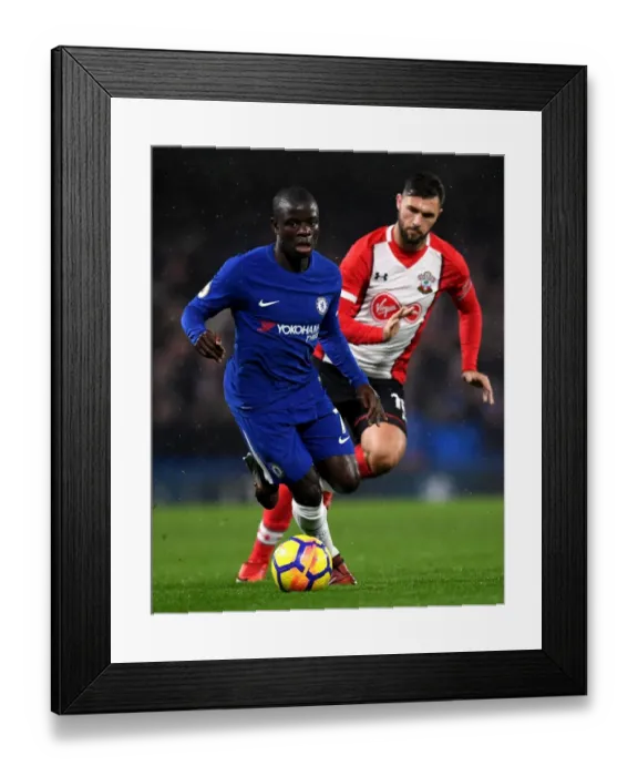 Framed Print : Chelsea's N'Golo Kante Outmaneuvers Southampton's Charlie Austin during Premier League Clash at Stamford Bridge