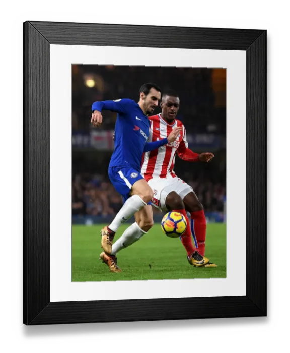 Framed Print : Intense Battle for Possession: Chelsea's Davide Zappacosta vs Stoke City's Julien Ngoy