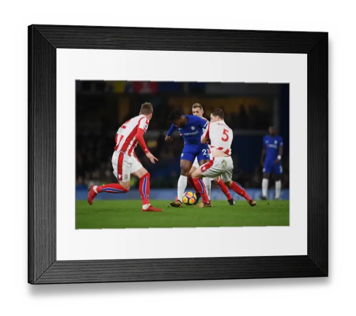 Framed Print : Batshuayi vs. Wimmer: Intense Battle for Possession in Chelsea vs. Stoke City Premier League Showdown Framed Print : Batshuayi vs. Wimmer: Intense Battle for Possession in Chelsea vs. Stoke City Premier League Showdown