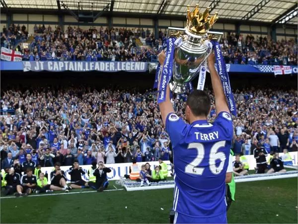 John Terry Lifts the Premier League Trophy: Chelsea's Triumph at Stamford Bridge