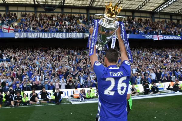 John Terry Lifts the Premier League Trophy: Chelsea's Triumph at Stamford Bridge