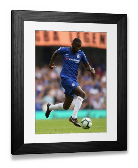 Framed Print : Chelsea's Ruediger Charges Forward in Premier League Clash against Cardiff Framed Print : Chelsea's Ruediger Charges Forward in Premier League Clash against Cardiff