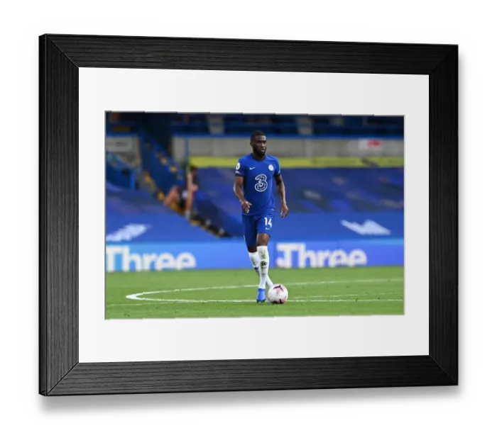Framed Print : Chelsea vs Liverpool: Fikayo Tomori Charges Forward in Premier League Showdown