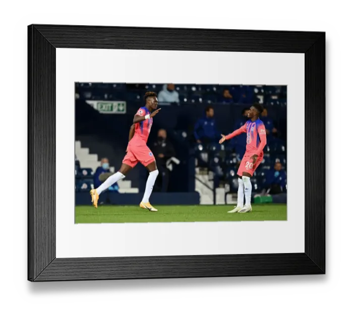 Framed Print : Chelsea's Abraham and Hudson-Odoi Celebrate Third Goal Against West Bromwich Albion in Empty Hawthorns Stadium Framed Print : Chelsea's Abraham and Hudson-Odoi Celebrate Third Goal Against West Bromwich Albion in Empty Hawthorns Stadium