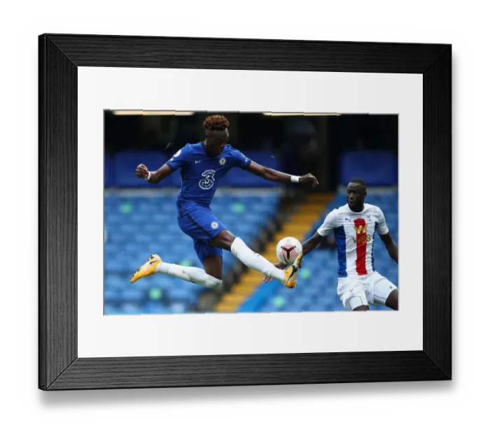 Framed Print : Chelsea vs Crystal Palace: Abraham Soars Above Kouyate in Empty Stamford Bridge Framed Print : Chelsea vs Crystal Palace: Abraham Soars Above Kouyate in Empty Stamford Bridge