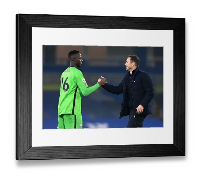 Framed Print : Chelsea's Mendy and Lampard: Post-Match Handshake at Empty Stamford Bridge (Chelsea v Sheffield United, Premier League) Framed Print : Chelsea's Mendy and Lampard: Post-Match Handshake at Empty Stamford Bridge (Chelsea v Sheffield United, Premier League)