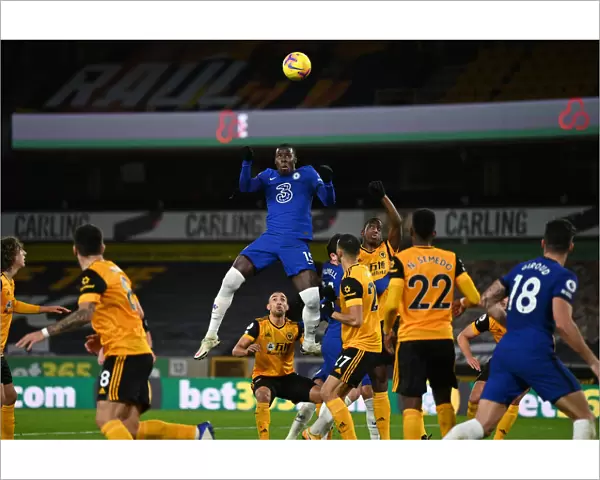 Chelsea's Kurt Zouma Heads the Ball in Empty Molineux Against Wolverhampton Wanderers - Premier League (15.12.20)