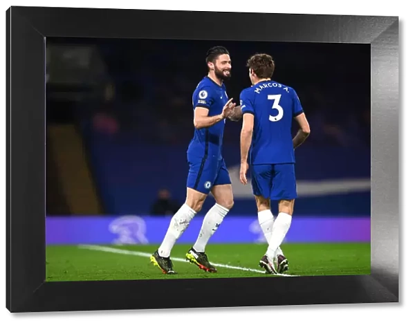 Chelsea's Olivier Giroud and Marcos Alonso Celebrate First Goal Against Newcastle United in Empty Stamford Bridge