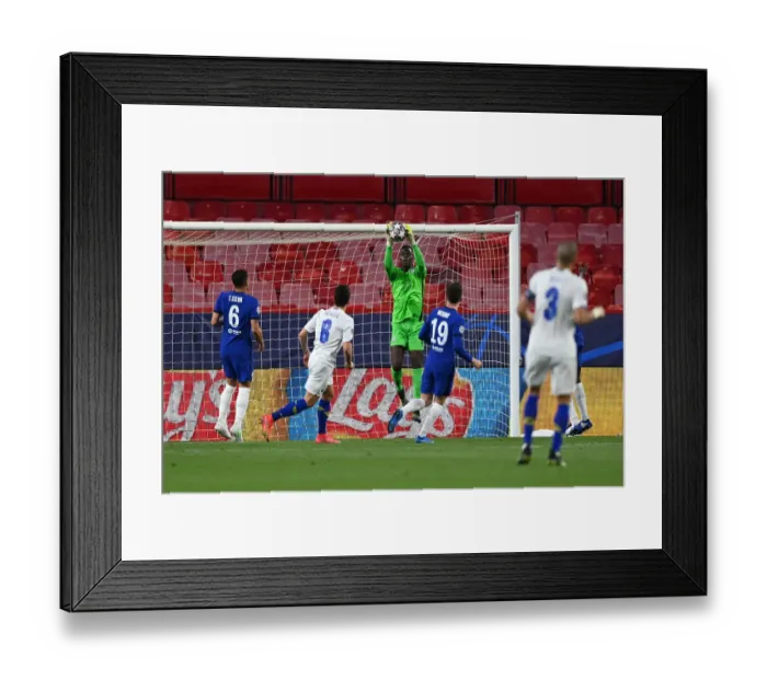 Framed Print : Chelsea's Edouard Mendy Makes Saving in Empty Estadio Ramon Sanchez Pizjuan during UEFA Champions League Quarterfinals vs Porto Framed Print : Chelsea's Edouard Mendy Makes Saving in Empty Estadio Ramon Sanchez Pizjuan during UEFA Champions League Quarterfinals vs Porto