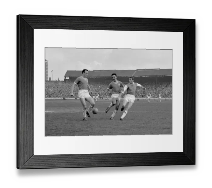 Framed Print : Intense Moment: David Herd of Arsenal Takes a Shot Against Chelsea's John Sillett and Mel Scott at Stamford Bridge