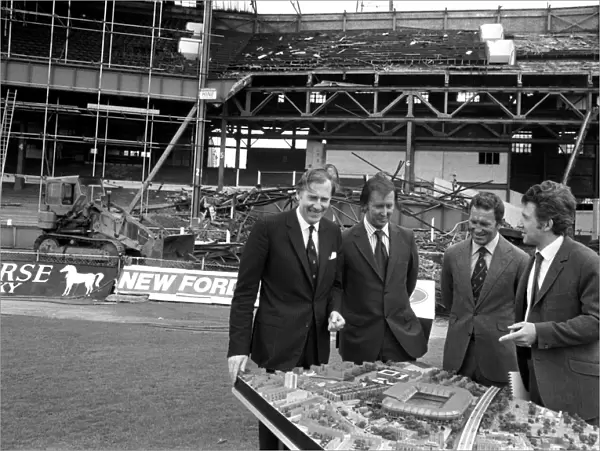 Chelsea's New Developments: Roger Bannister, Brian Mears, Dave Sexton, and John Darbourne Examine Stamford Bridge Model Amid Demolition