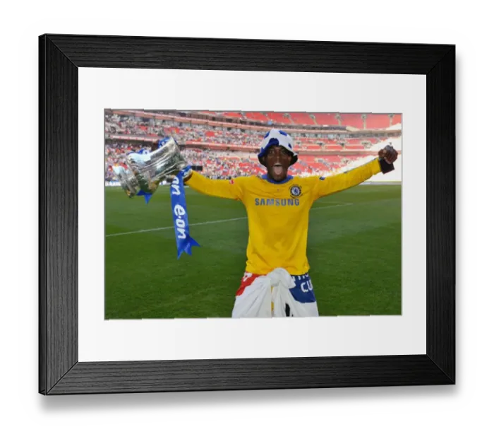 : Michael Essien Celebrates FA Cup Victory with Chelsea after Winning against Everton at Wembley Stadium (2009) : Michael Essien Celebrates FA Cup Victory with Chelsea after Winning against Everton at Wembley Stadium (2009)