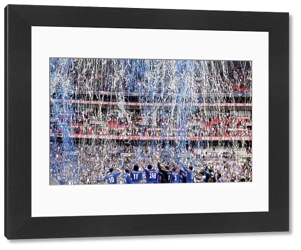 Chelsea Celebrates FA Cup Victory: Chelsea Players and the FA Cup Trophy at Wembley Stadium (vs Manchester United)