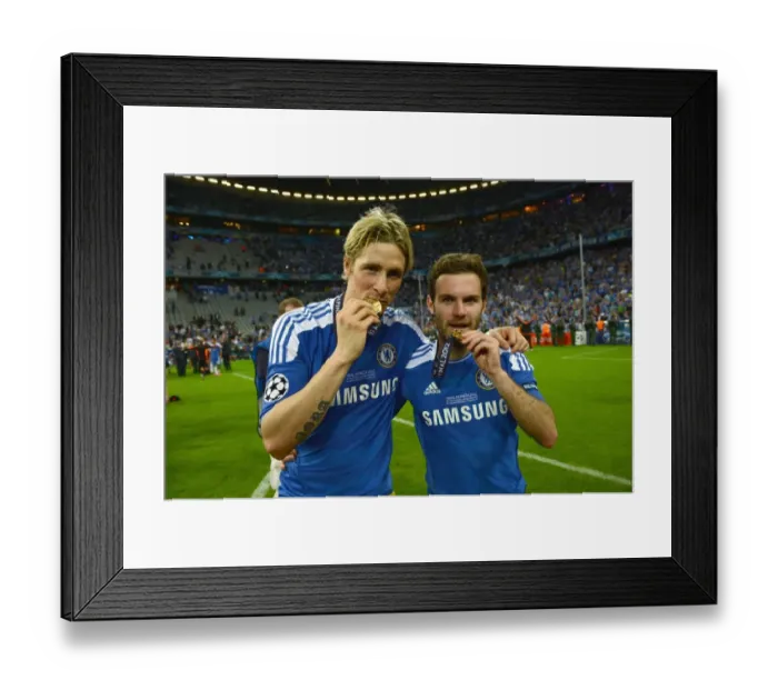 Framed Print : Chelsea's Champions League Triumph: Fernando Torres and Juan Mata Celebrate Victory over Bayern Munich (2012)