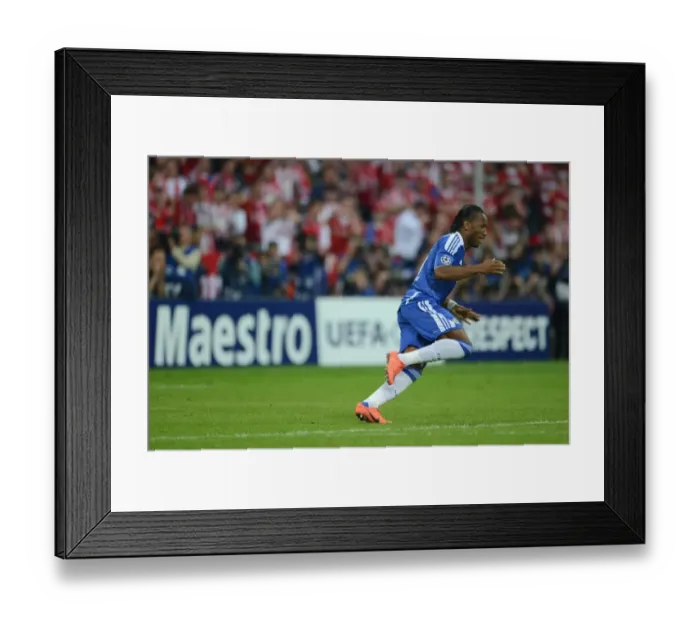 Framed Print : Didier Drogba's Triumphant Champions League Victory Celebration vs. FC Bayern Munich (2012) Framed Print : Didier Drogba's Triumphant Champions League Victory Celebration vs. FC Bayern Munich (2012)