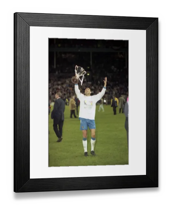 Framed Print : Chelsea's Gus Poyet Hoists the UEFA European Cup-Winners Cup after Victory over VfB Stuttgart, 1998 Framed Print : Chelsea's Gus Poyet Hoists the UEFA European Cup-Winners Cup after Victory over VfB Stuttgart, 1998