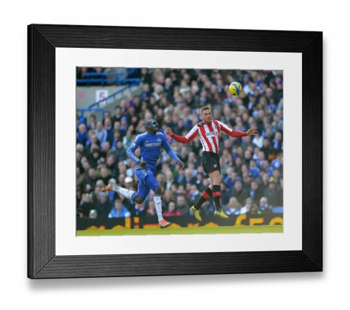 Framed Print : Battleground Stamford Bridge: Demba Ba vs Harlee Dean - FA Cup Fourth Round Replay Clash Framed Print : Battleground Stamford Bridge: Demba Ba vs Harlee Dean - FA Cup Fourth Round Replay Clash