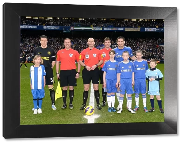 Frank Lampard and Gary Caldwell Lead Teams Out at Stamford Bridge: Premier League Clash between Chelsea and Wigan Athletic - Mike Dean Referees with Match Mascots