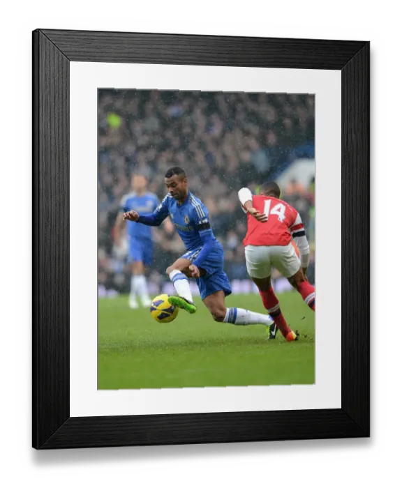 Framed Print : Clash at Stamford Bridge: Cole vs. Walcott - Premier League Showdown (Chelsea vs. Arsenal, January 2013) Framed Print : Clash at Stamford Bridge: Cole vs. Walcott - Premier League Showdown (Chelsea vs. Arsenal, January 2013)