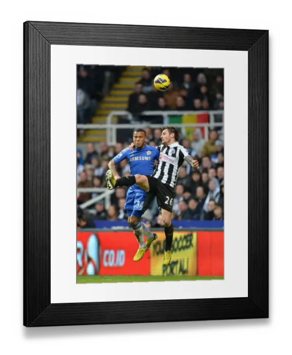 Framed Print : Battle for the Ball: Bertrand vs Debuchy - Intense Aerial Clash in Chelsea vs Newcastle United (February 2013) Framed Print : Battle for the Ball: Bertrand vs Debuchy - Intense Aerial Clash in Chelsea vs Newcastle United (February 2013)