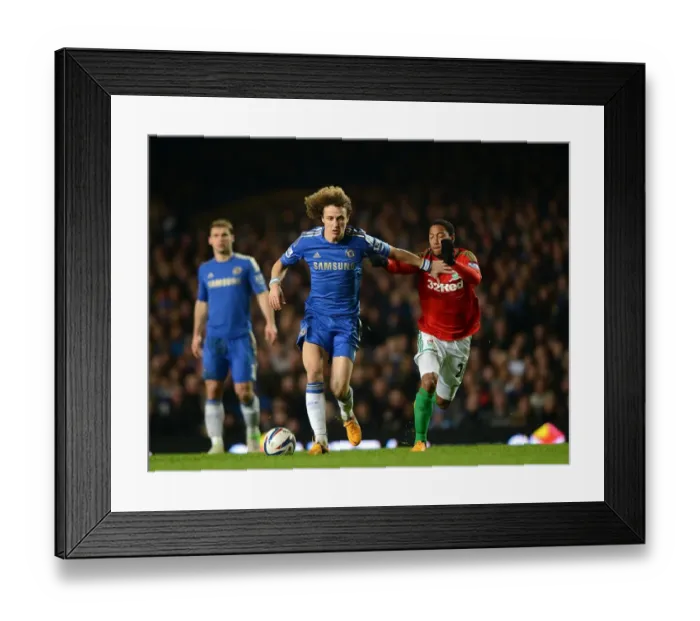 Framed Print : David Luiz vs. Jonathan de Guzman: A Fierce Battle for Ball Possession in the Chelsea vs. Swansea Capital One Cup Semi-Final (January 9, 2013)