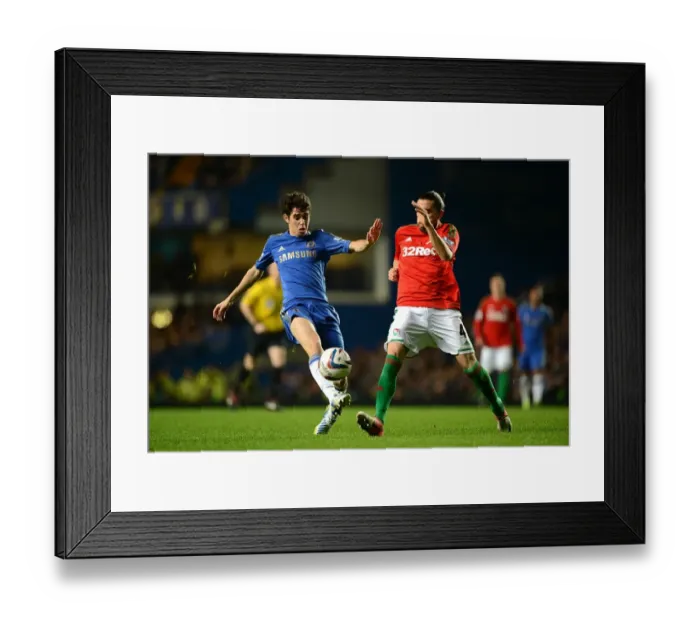 Framed Print : A Battle for the Ball: Oscar vs Chico - Chelsea vs Swansea City, Capital One Cup Semi-Final, Stamford Bridge (9th January 2013)