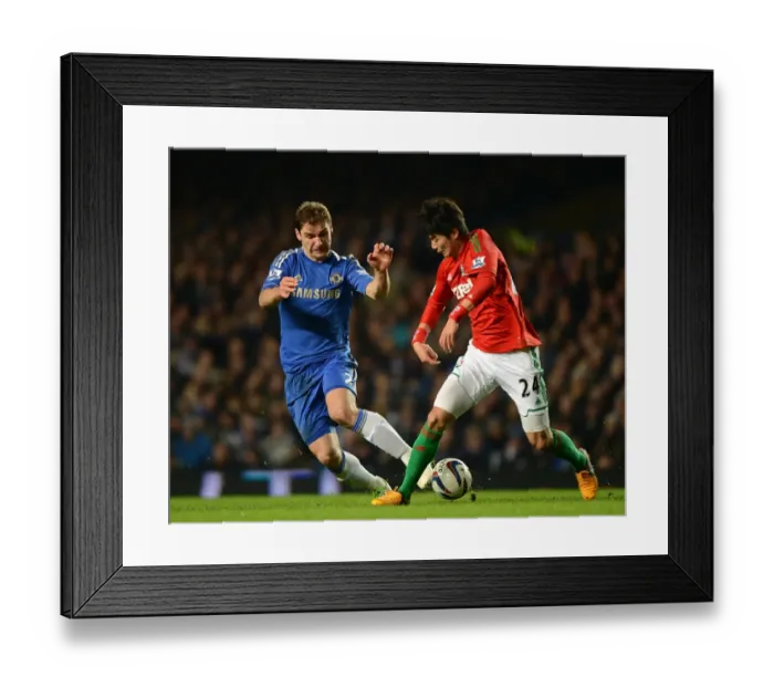 Framed Print : Battle for the Ball: Ivanovic vs. Ki - Chelsea vs. Swansea, Capital One Cup Semi-Final (9th January 2013) Framed Print : Battle for the Ball: Ivanovic vs. Ki - Chelsea vs. Swansea, Capital One Cup Semi-Final (9th January 2013)