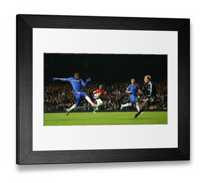 Framed Print : Demba Ba vs. Gerhard Tremmel: A Fierce Battle in the Capital One Cup Semi-Final at Stamford Bridge Framed Print : Demba Ba vs. Gerhard Tremmel: A Fierce Battle in the Capital One Cup Semi-Final at Stamford Bridge