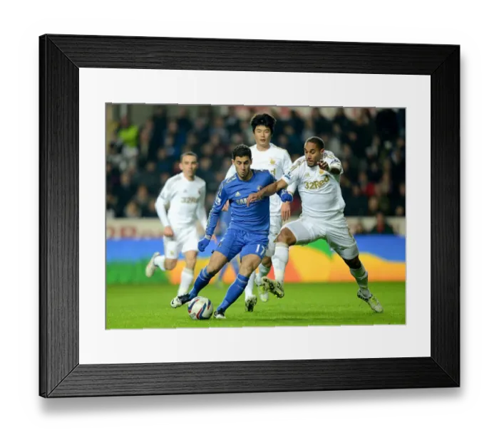 Framed Print : Battle for Ball Supremacy: Eden Hazard vs. Ashley Williams in the Intense Chelsea-Swansea League Cup Semi-Final Clash Framed Print : Battle for Ball Supremacy: Eden Hazard vs. Ashley Williams in the Intense Chelsea-Swansea League Cup Semi-Final Clash