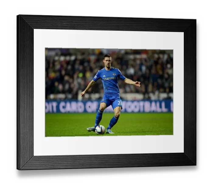 Framed Print : Gary Cahill: Chelsea Star Faces Off in Intense Capital One Cup Semi-Final Clash Against Swansea City at Liberty Stadium