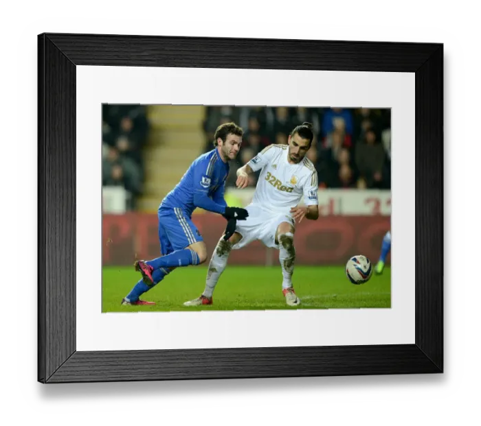 Framed Print : Intense Rivalry: Juan Mata vs. Chico - Battle for Ball in Chelsea vs. Swansea Capital One Cup Semi-Final