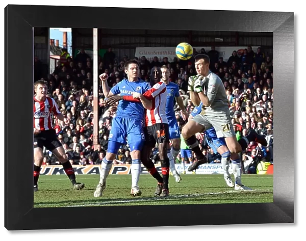 Frank Lampard's Shot Defied by Brentford Goalkeeper Moore in FA Cup Clash (January 2013)