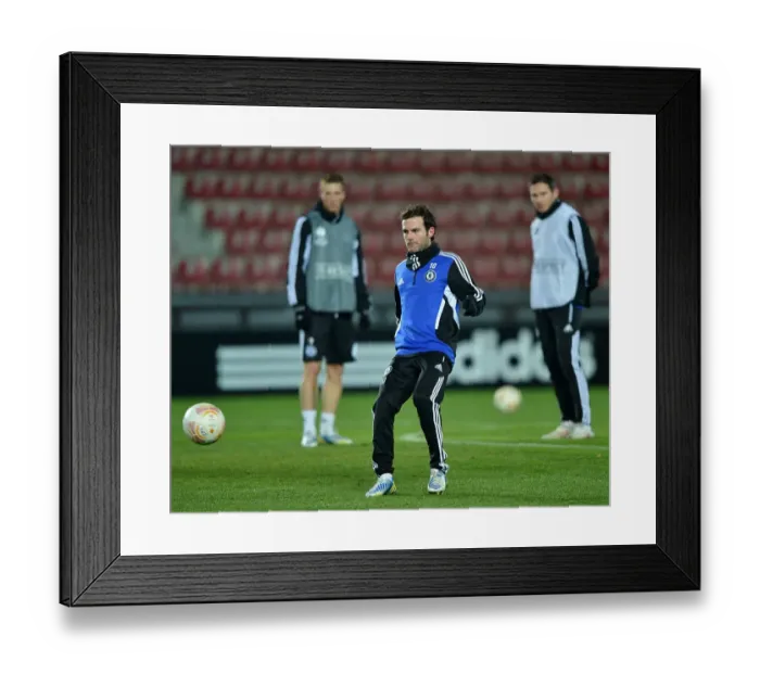 Framed Print : Juan Mata's Intense Focus: Chelsea FC Training Before UEFA Europa League Match at Generali Arena Framed Print : Juan Mata's Intense Focus: Chelsea FC Training Before UEFA Europa League Match at Generali Arena