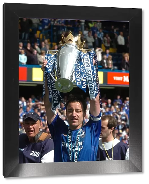 John Terry Lifts the Premier League Trophy: Chelsea's Triumph over Manchester United at Stamford Bridge (2005-2006)