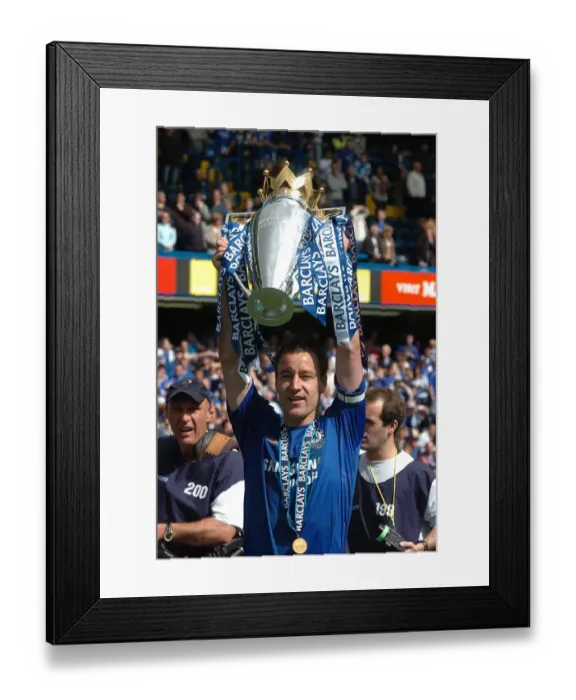 Framed Print : John Terry Lifts the Premier League Trophy: Chelsea's Triumph over Manchester United at Stamford Bridge (2005-2006) Framed Print : John Terry Lifts the Premier League Trophy: Chelsea's Triumph over Manchester United at Stamford Bridge (2005-2006)