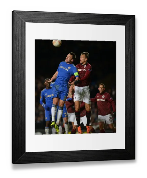 Framed Print : John Terry vs. Ondrej Svejdik: A Battle for the Ball in Chelsea's UEFA Europa League Clash against Sparta Prague (February 2013) Framed Print : John Terry vs. Ondrej Svejdik: A Battle for the Ball in Chelsea's UEFA Europa League Clash against Sparta Prague (February 2013)