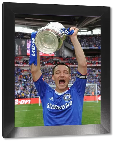 Chelsea's Glory: John Terry Lifts the FA Cup at Wembley Stadium (2010)