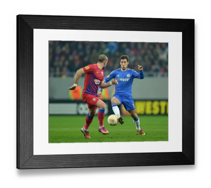Framed Print : Hazard vs. Latovlevici: A Battle for Ball Possession - Chelsea vs. Steaua Bucharest, UEFA Europa League Round of 16 (7th March 2013) Framed Print : Hazard vs. Latovlevici: A Battle for Ball Possession - Chelsea vs. Steaua Bucharest, UEFA Europa League Round of 16 (7th March 2013)