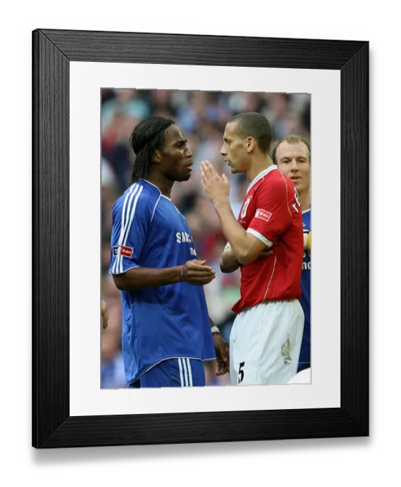 Framed Print : Showdown at Wembley: Drogba vs. Ferdinand - The FA Cup Final Battle, 2007: Chelsea vs. Manchester United Framed Print : Showdown at Wembley: Drogba vs. Ferdinand - The FA Cup Final Battle, 2007: Chelsea vs. Manchester United