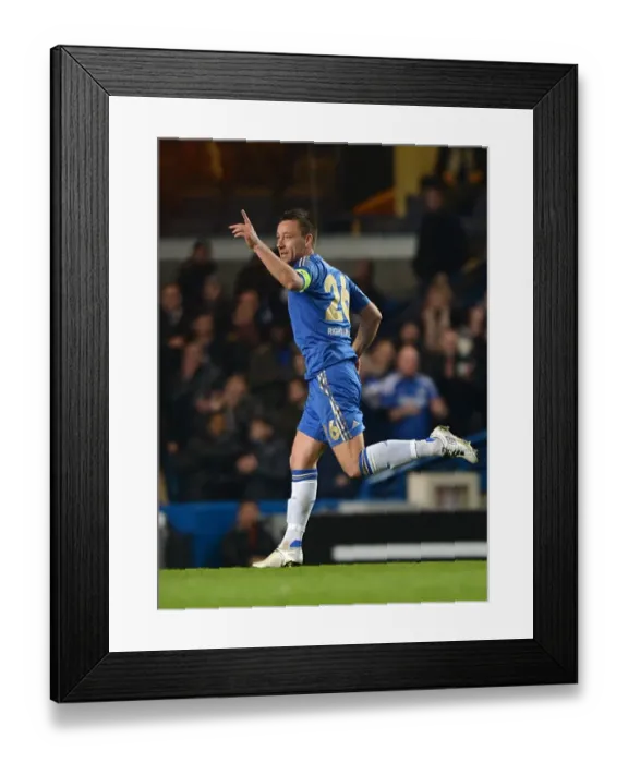 Framed Print : John Terry's Euphoric Moment: Celebrating Chelsea's Second Goal vs. Steaua Bucharest in UEFA Europa League (14th March 2013)