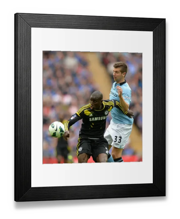 Framed Print : FA Cup Semi-Final Showdown: A Battle Between Chelsea's Demba Ba and Manchester City's Matija Nastasic at Wembley Stadium (April 14, 2013)