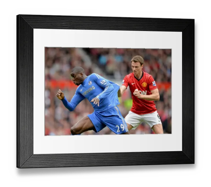 Framed Print : Clash at Old Trafford: Demba Ba vs. Jonny Evans - Manchester United vs. Chelsea, Premier League Showdown (5th May 2013) Framed Print : Clash at Old Trafford: Demba Ba vs. Jonny Evans - Manchester United vs. Chelsea, Premier League Showdown (5th May 2013)